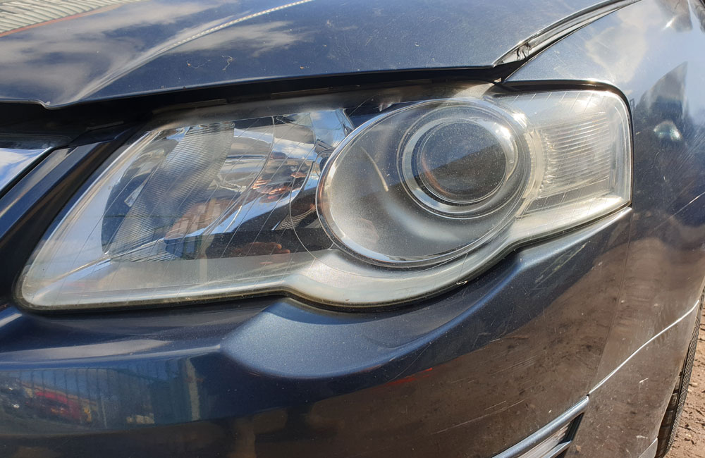 VW Passat TDI Sport Headlight passenger side front